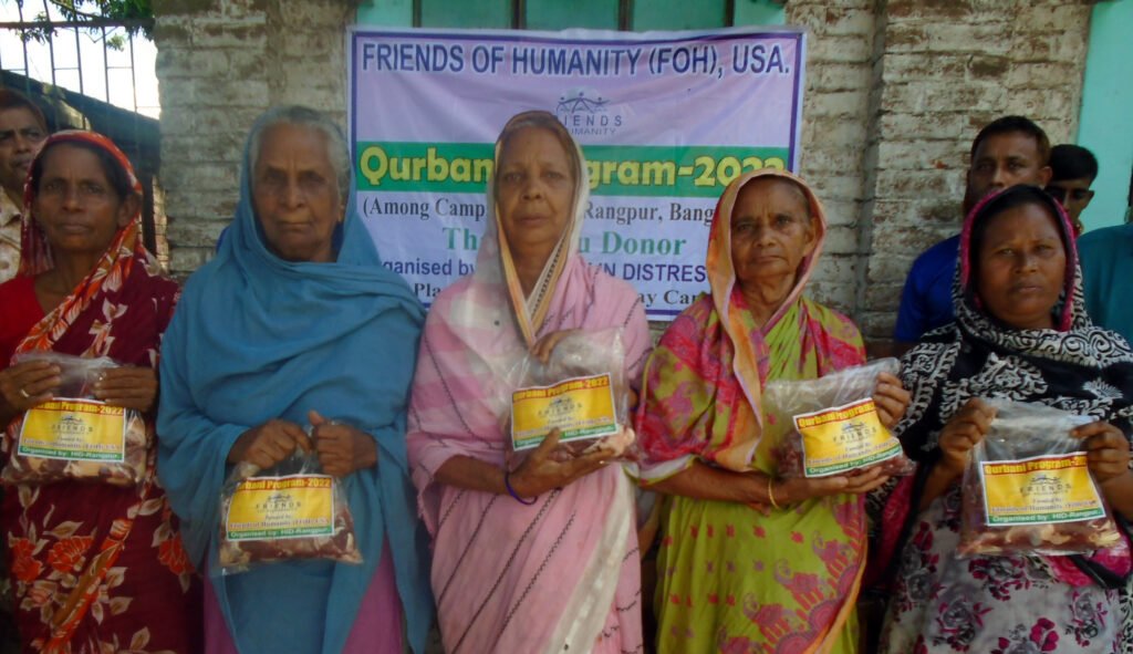 Meat is distributed among the Badarganj Railway Camp through animal sacrifice.