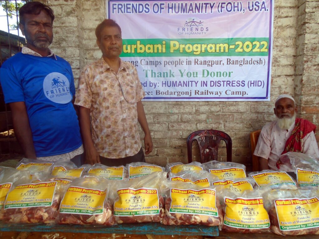 Meat is distributed among the Badarganj Railway Camp through animal sacrifice.