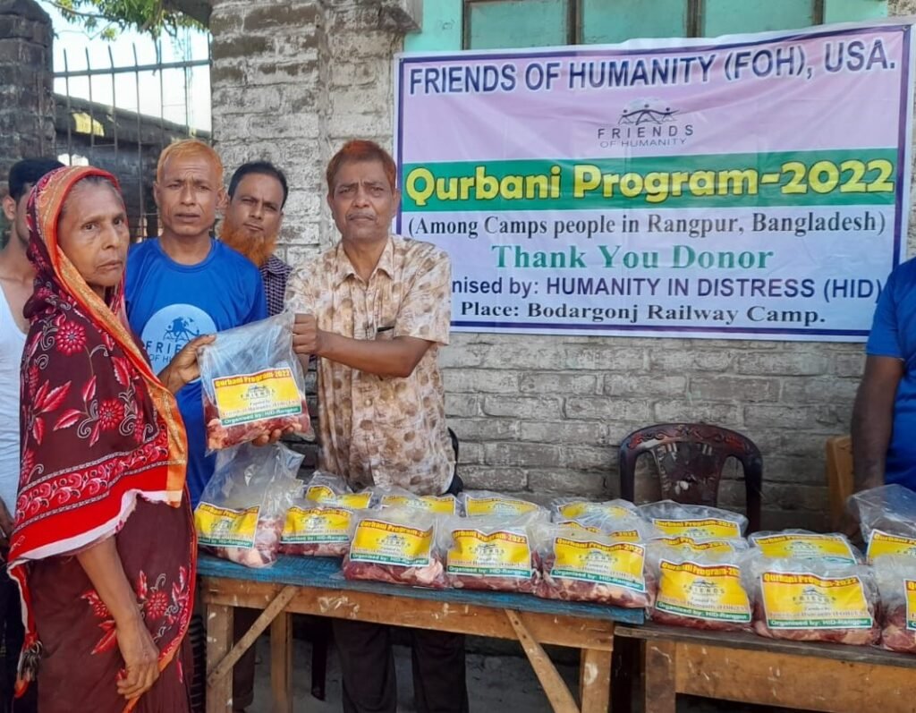 Meat is distributed among the Badarganj Railway Camp through animal sacrifice.