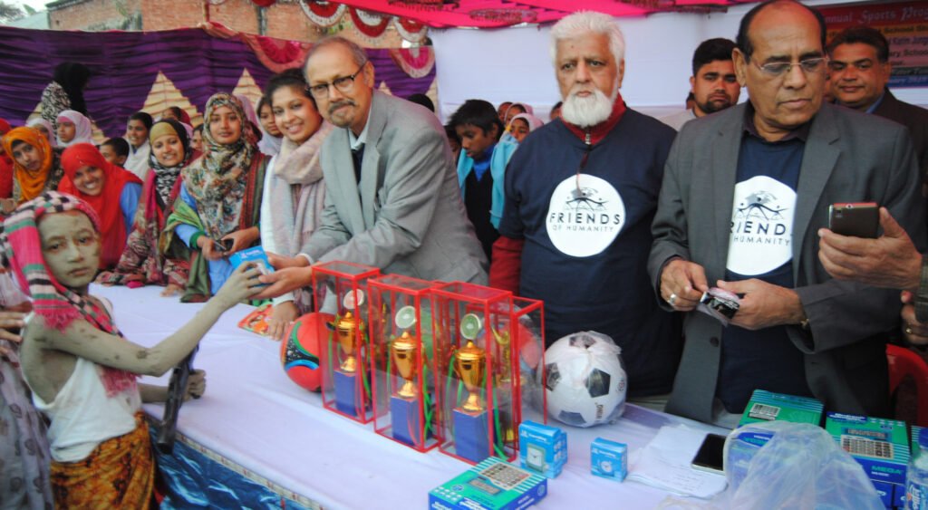 Student receives gift for the Annual Sports Program-2018 from Ehetesham Arshad Nezami.